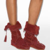 Botas Winki de cuero trenzado y ante